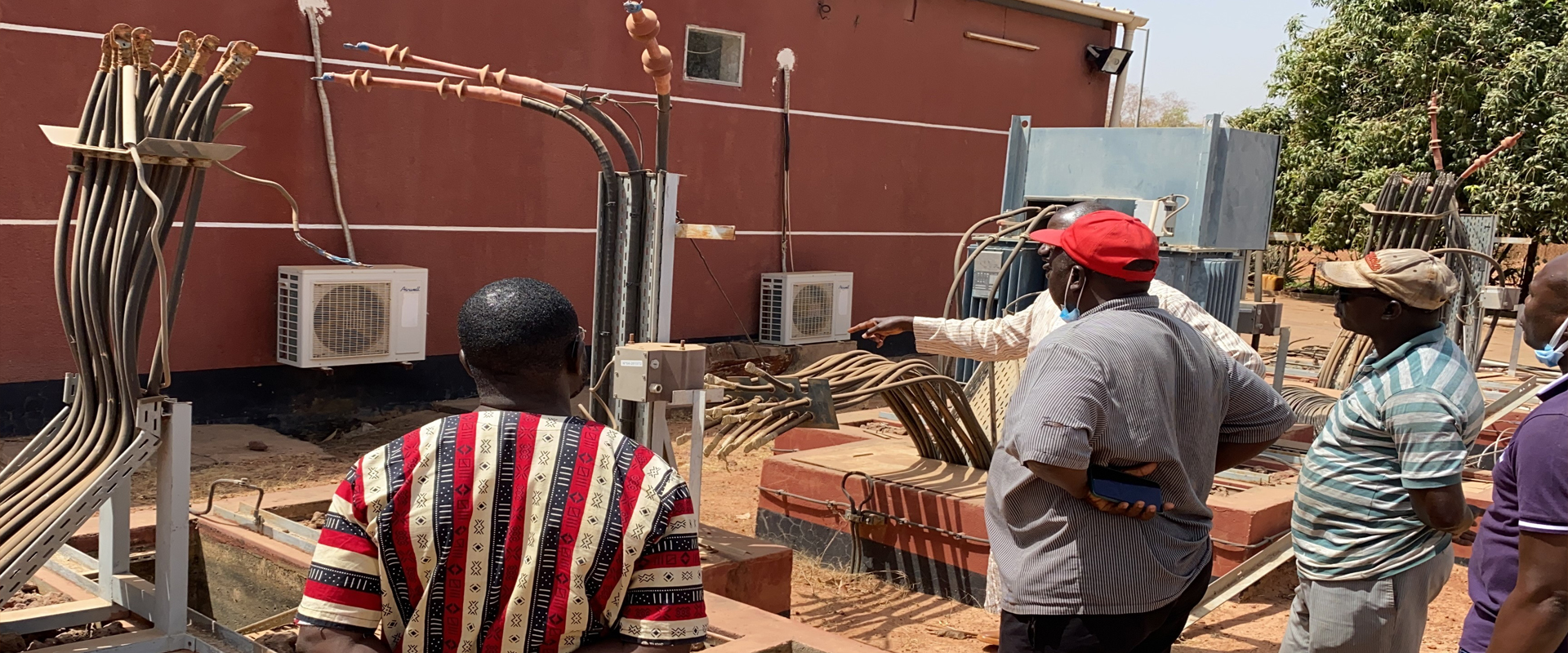Kaltech technicians inspecting power equipment